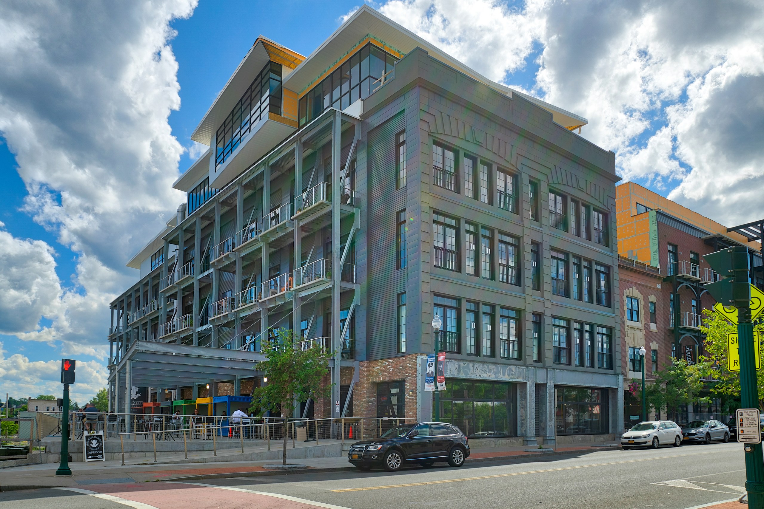 The Lofts at Frog Alley, Schenectady, NY: Street corner with balconies and brewery patio