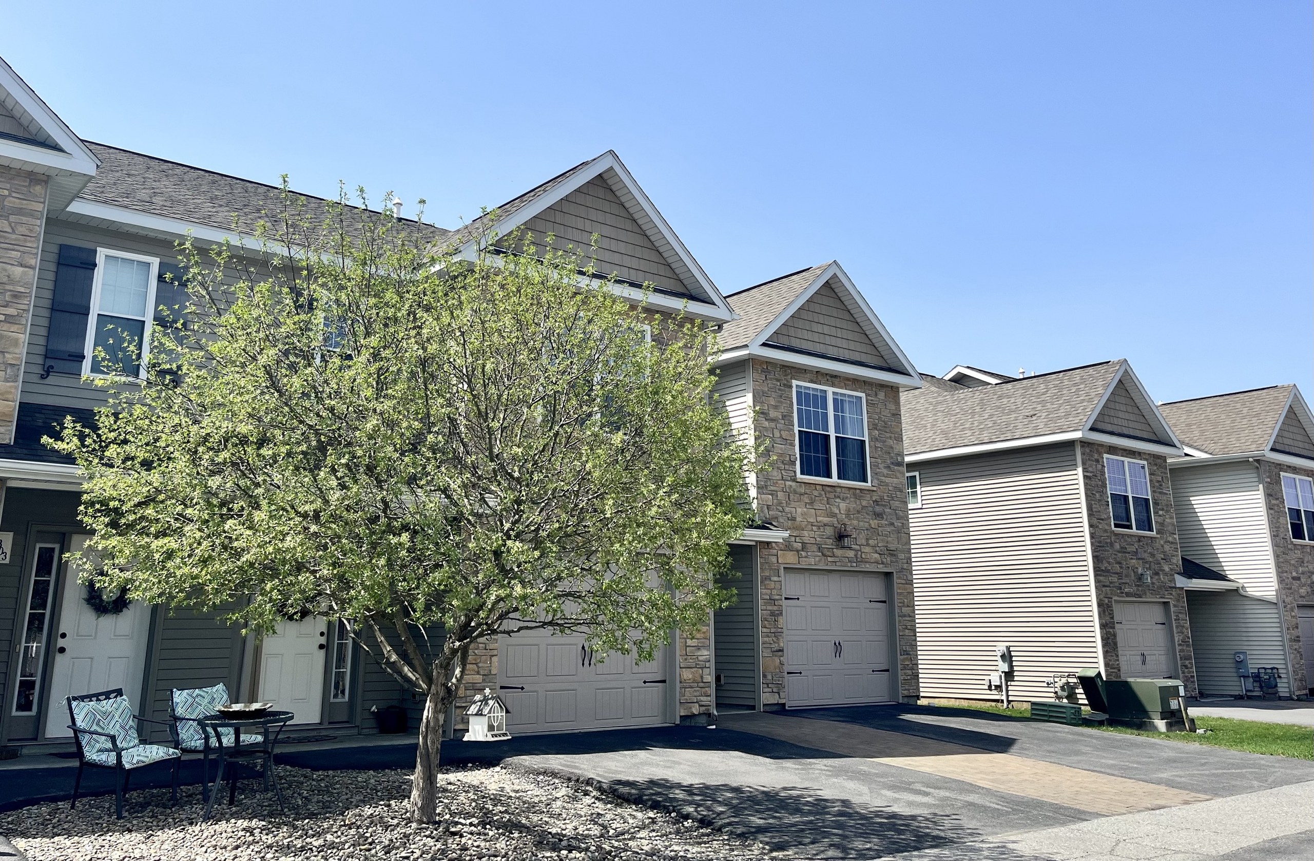 Ridgeview Townhomes, Gansevoort, NY: Townhome row with flowering tree