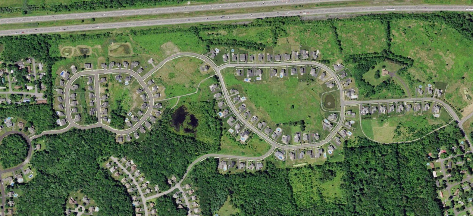 Travers Meadows, Malta, NY: Aerial, matched to the site plan