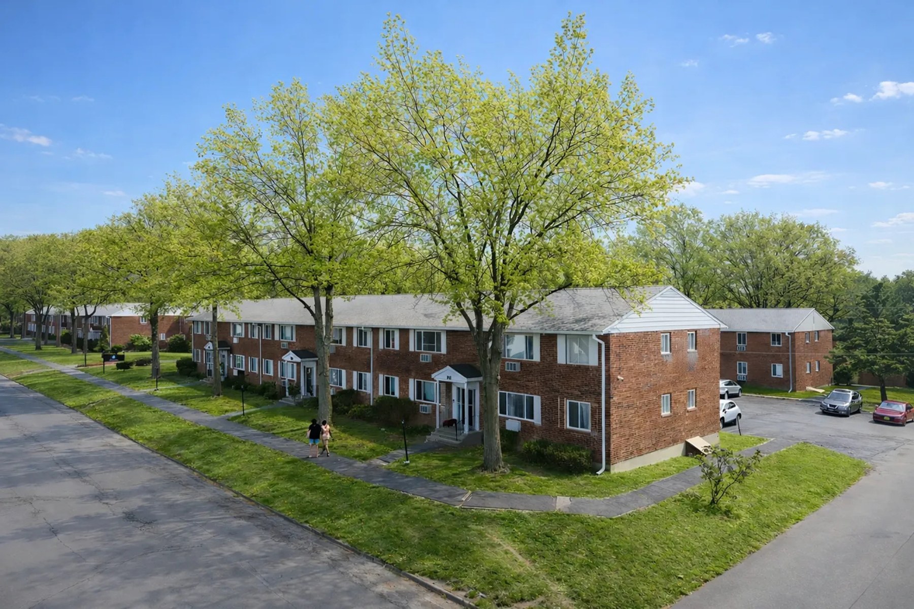 Harbour Point Gardens, Troy, NY: Brick buildings among mature trees
